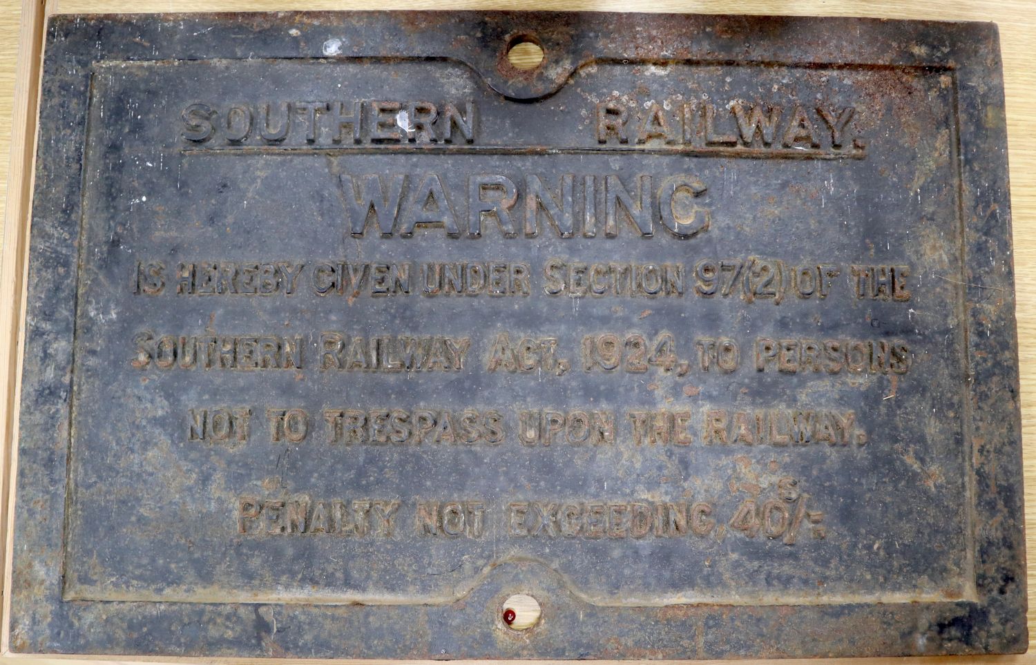 A cast iron Southern Railway warning sign, 40 x 62cm